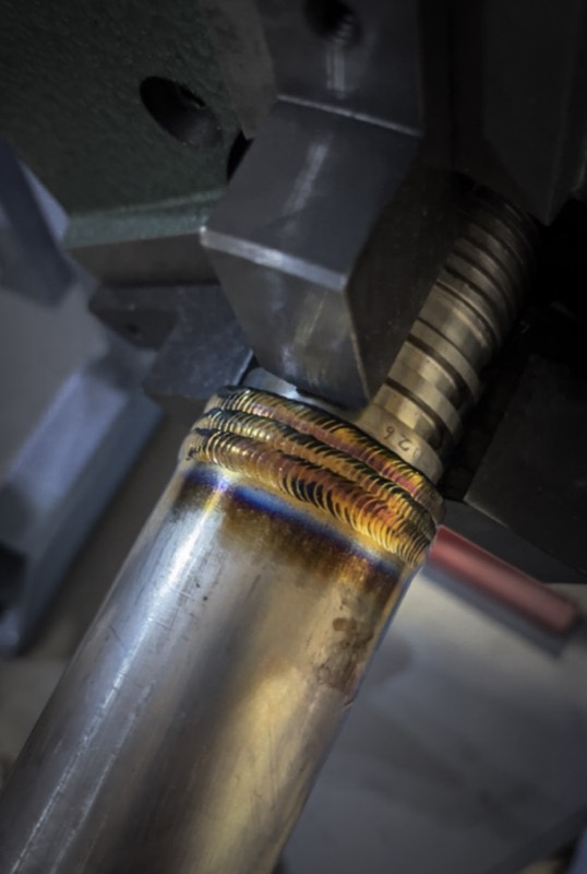 TIG weld bead joining a threaded stem to a pipe