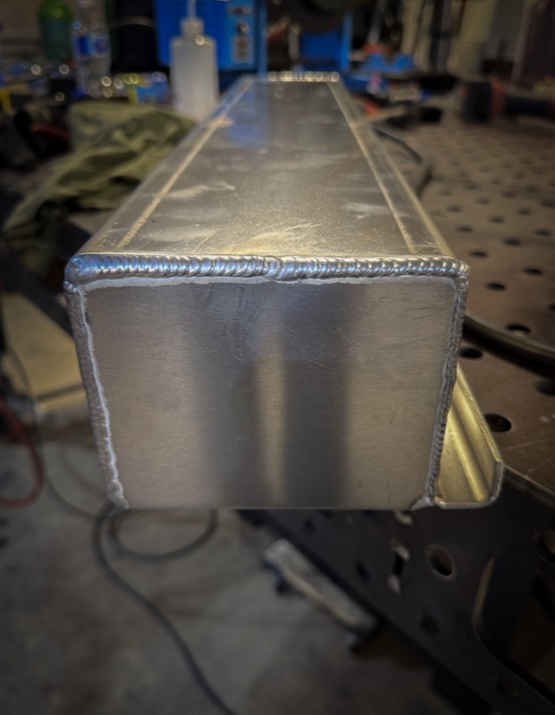 Corner welds on a fabricated aluminum tube