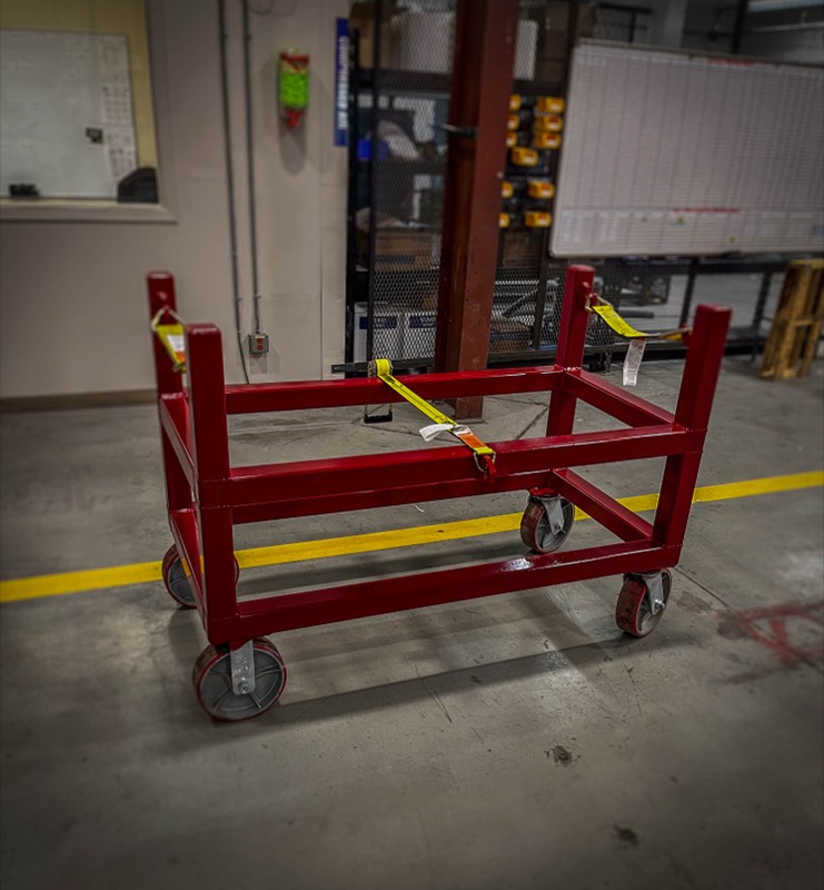 Compact red strap-frame cart on casters