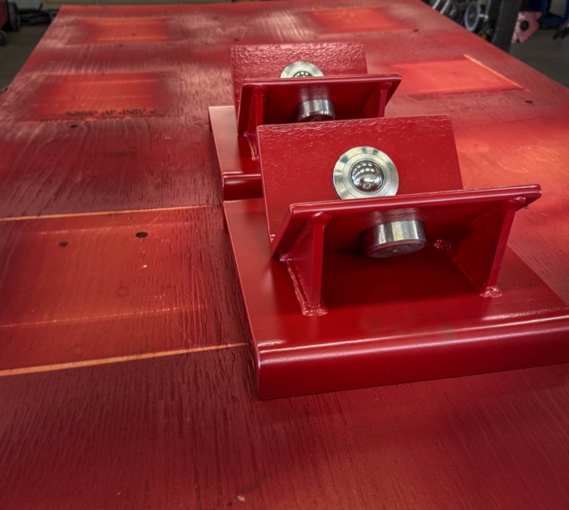 Red pipe roller sled with bushings